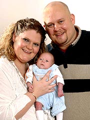 Brown with husband Wesley Mullinder and son Cameron, Born December 20, 2006