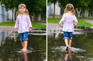 Girl to walk barefoot in a puddle