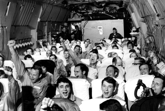 Newly freed prisoners of war celebrate as their C-141A aircraft lifts off from Hanoi, North Vietnam, on Feb. 12, 1973, during Operation Homecoming. The mission included 54 C-141 flights between Feb. 12 and April 4, 1973, returning 591 POWs to American soil. U.S. Air Force photo (Released)