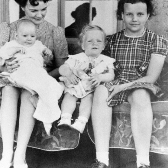 28 Apr 1940, El Paso, Texas, USA --- Original caption: Sandra Day O'Connor (right) is shown in family album picture from Easter 1940, taken on family ranch. Her mother, Ada Mae Day, holds brother Alan, who now runs the ranch. Sister Ann is in middle. President Reagan has nominated Mrs. O'Connor to the U.S. Supreme Court. --- Image by © Bettmann/CORBIS