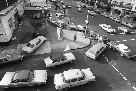 On Dec. 23, 1973, cars lined up in two directions at a gas station in New York City.